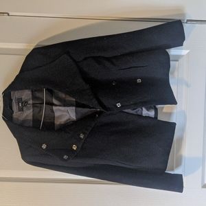 Black short peacoat.